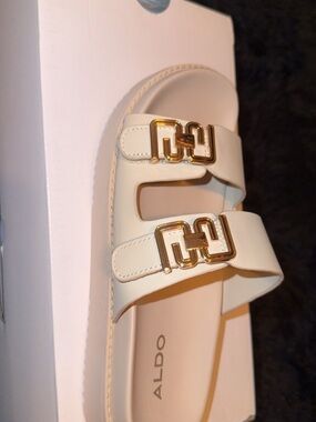 ALDO Cream Slide Sandals with Gold Buckle Accents